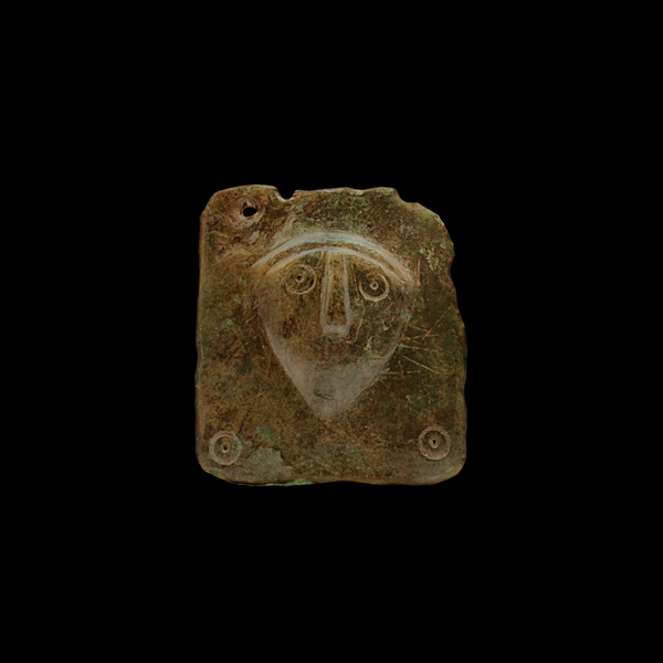 Brooch with human face