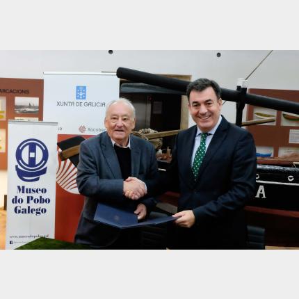 Justo Beramendi y Román Rodríguez en la firma del convenio