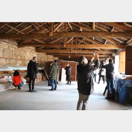 Representantes dos estudios de arquitectura durante a visita ao museo